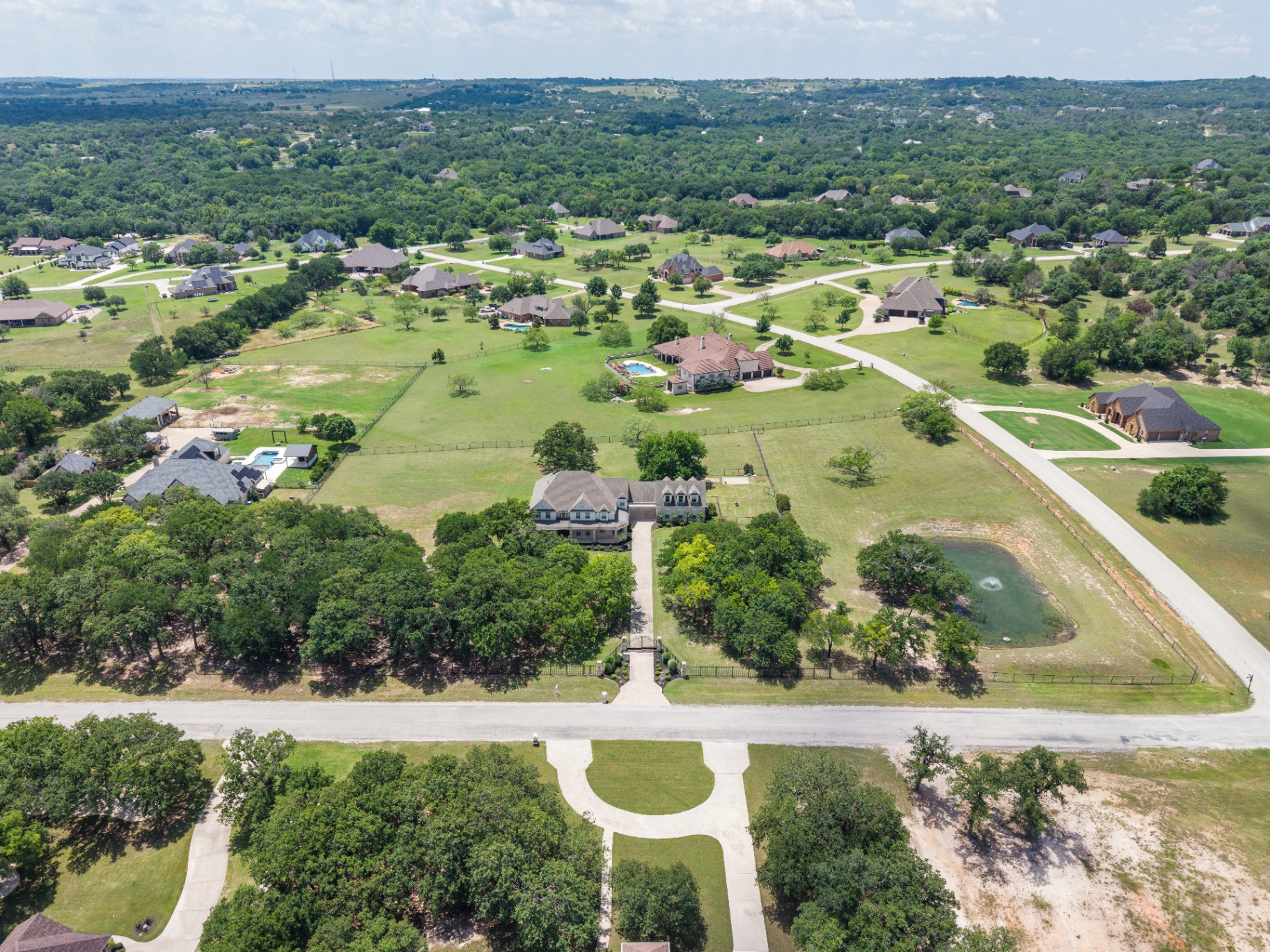 Aerial view of the estate and surrounding acreage